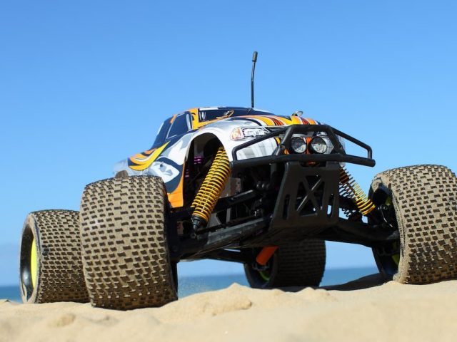 1/8 scale radio control nitro powered monster truck on the beach