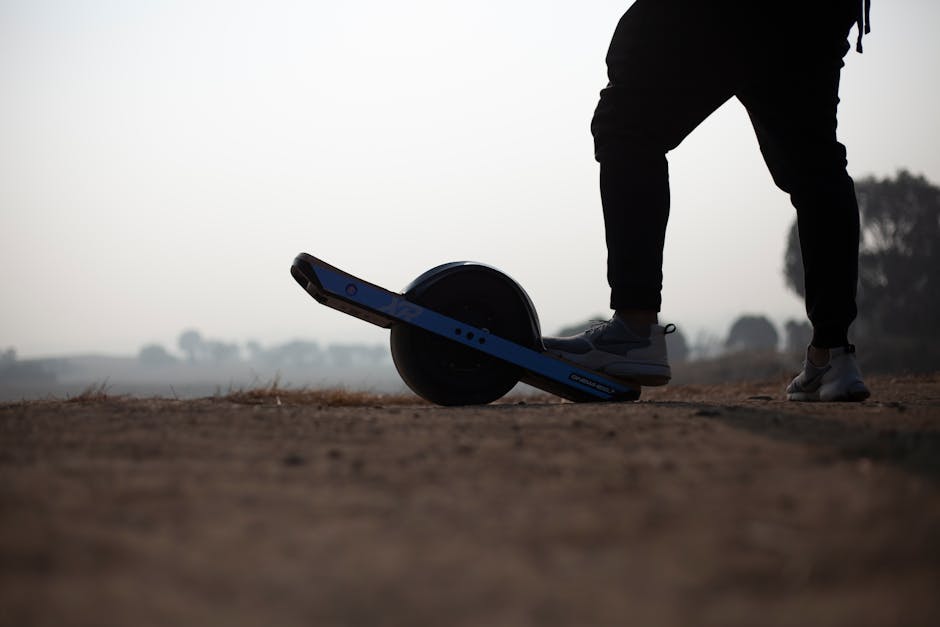 Image of a person wearing a helmet while electric skateboarding. Avoid using words, letters or labels in the image when possible.